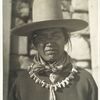 Navajo, Ganado, Arizona, wearing a string of turquoise he had purchased for $25.00.