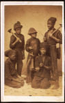 Studio portrait of young chimney sweeps.