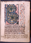 Initial with large scale foliage; red, blue and ochre gothic capitals form a panel adjacent to initial for the first verses of Ps. 1