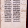 Page of text with commentary and pointers in margins