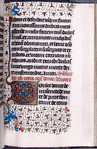 Opening of French text, border decoration, large initial, rubric