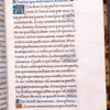 Prayer in French; rubrics in blue
