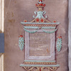 Purple folio with title in gold in elaborate frame facing the opening of the Triumph of Chastity