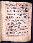 Page of text, ruled in red, with red initials and rubric