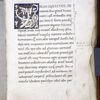 Opening of "De bello Jugurthino." Large gold initial on blue field with white vinestem, capitals. Marginal note