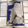 Third map of Europe (France and Belgium). Full gold border. Commentary text in green border, with gold rubrics and 4-line gold initial on green, pink and blue field