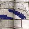 Fifth map of Europe (the Balkans, Austria, Switzerland), with gold border, commentary text in pink border with 4-line gold inital on pink and blue field