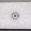 Compass sunk into back pasteboard