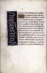 Page of text with initial, lateral border containing words in French. Trace of catchword in lower margin