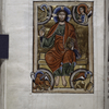 Full-page miniature of Christ in majesty with four evangelist symbols.