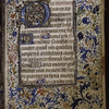 Opening of main text, with initials, border and rubrics
