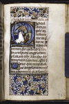 Historiated initial with the Archangel Michael; partial border, initial and rubrics