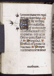 Page of text with initial (sprouting vines into border), rubrics, placemarkers, catchword