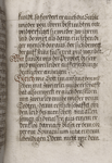 Text with rubrics, small pen flourishes, and quire signature
