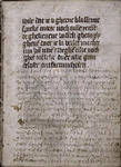 Page of text with notes in blank space; quire signature in upper left corner