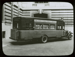 Book truck at 40th street entrance of N.Y.P.L. Central building, ca. 1930s, showing it ready to start on it destination