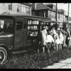Bronx traveling library, Sept., 1928, parked on a grassy verge.