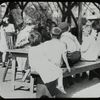 Corlear's Hook Park : boys and girls at table, playground library, ca. 1910s