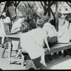 Corlear's Hook Park : boys and girls at table, playground library, ca. 1910s