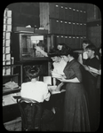 Envelope company : men and women lined up to check out books at Envelope Factory, Aug. 30, 1910