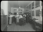 National Cloak & Suit Co. : people choosing books, 1916