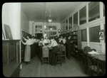 National Cloak & Suit Co. : people choosing books, 1916