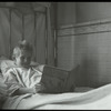 Post Graduate Hospital : boy reading Just so stories in bed, 1923
