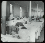Women in ward reading braille books, Post Graduate Hospital? [No, dress typical of earlier period, possibly Blackwell's Island?]