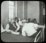 Post Graduate Hospital : one blind man reads braille to another, [Post Graduate library on label, possibly Blackwell's Island, see Photo/Branches]