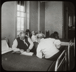 Post Graduate Hospital : one blind man reads braille to another, [Post Graduate library on label, possibly Blackwell's Island, see Photo/Branches]