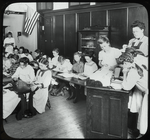 Girls in classroom, Traveling Library at Public School Playground, July 1910