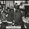 Work with schools, Aguilar Branch : students in browsing room after the book talk, 1938.