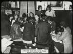 Work with schools, Aguilar Branch : students in browsing room after the book talk, 1938