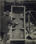 Contract No. 3. Cast-iron tunnel segment with grout plug temporarily removed. 4/9/23, 1:30 p.m.