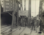 Gank about to go down shaft on cage. Canal Street shaft, New York, 4/24/23, 3:45 p.m.