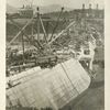Ashokan Reservoir. View of Olive Bridge dam showing down-stream face of masonry section. Stone crusher and concrete mixing plant in left background. Contract 3. June 21, 1910.