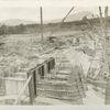 Ashokan reservoir. View showing construction of Dividing weir with gate-house in foreground.l Note four 5-foot  by 15-foot sluice-gates in place. Contract 3. July 8, 1913.