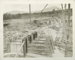 Ashokan reservoir. View showing construction of Dividing weir with gate-house in foreground.l Note four 5-foot  by 15-foot sluice-gates in place. Contract 3. July 8, 1913.