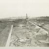 Ashokan reservoir. Dividing weir with foundation piers for Ashokan bridge. West basin and Winchell hill at right and Discharge channel to East basin at left. Contract 3. October 26, 1914.