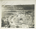Kensico reservoir. View showing excavation for foundation of Kensico dam in progress. Note wooden flume for controlling water of Bronx river. Contract 9. July 30, 1912.