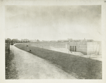 Hill View reservoir.  Uptake chamber and completed reservoir embankment showing concrete lining with dry-rubble masonry above, followed by top course of riprap. Contrac 30. May 12, 1915.