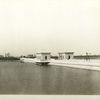 Silver Lake reservoir.  View showing Middle Dike roadway, parapets and gate-chambers. South basin in foreground. Contract 89 and 144. October 2, 1917.