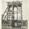 Rondout pressure tunnel. View of head-frame and cage with muck car at Shaft 1. Contract 12. July 20, 1909.