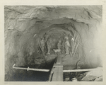 Rondout pressure tunnel.  Tunnel excavation showing operation on both bench and heading in progress. Contract 12. July 20, 1909.