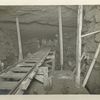 Rondout pressure tunnel. Placing concrete in excavated mud seam in the rock above the tunnel lining. Contract 12. July 20, 1911.