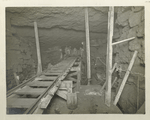 Rondout pressure tunnel. Placing concrete in excavated mud seam in the rock above the tunnel lining. Contract 12. July 20, 1911.