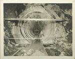 Wallkill  pressure tunnel. End view of section of concrete lining with invert laid in foreground. Erection forms in progress  in background. Contract 47. April 11, 1911.