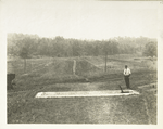 Boat hole. Boat hole (steel cover) at north end of the St. Elmo siphon. Central New England railroad crossing the siphon. Contract 17. August 21, 1917.