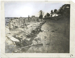 Confederate dead behind a stone wall at Fredericksburg.