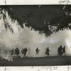 Soldiers charging through gas while in training at Fort Lewis, Washington.